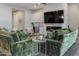 Living room featuring a fireplace, wet bar, comfortable seating, and recessed lighting at 8911 S 14Th Way, Phoenix, AZ 85042