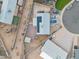 Aerial view of the house featuring the backyard, shed, fence, and solar panels at 907 N Menze St, Casa Grande, AZ 85122