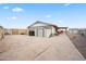 The backyard showcases an extended patio, concrete, and sheds at 907 N Menze St, Casa Grande, AZ 85122