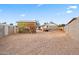 Wide backyard featuring a storage shed and ample space for outdoor activities or potential landscaping projects at 907 N Menze St, Casa Grande, AZ 85122