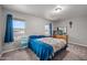 Comfortable bedroom with plush carpet, ample natural light, and a serene atmosphere at 907 N Menze St, Casa Grande, AZ 85122