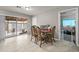 Cozy dining area with access to outdoor area, perfect for enjoying meals and entertaining Gathering at 907 N Menze St, Casa Grande, AZ 85122