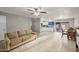 Bright living room flows into an open kitchen with updated appliances and ample counter space at 907 N Menze St, Casa Grande, AZ 85122