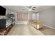 Open-concept living room featuring neutral walls and tile floors, ideal for entertaining guests at 907 N Menze St, Casa Grande, AZ 85122