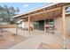 Spacious covered patio perfect for outdoor dining and entertaining, with convenient access to the home at 907 N Menze St, Casa Grande, AZ 85122