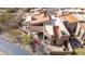 Stunning aerial view of a luxury home with a tile roof, covered patio, and beautiful landscaping, showcasing its unique design at 9110 E Clubhouse Ct # 639, Scottsdale, AZ 85262