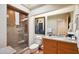 Well-appointed bathroom features glass enclosed shower, granite counters, and tile flooring at 9110 E Clubhouse Ct # 639, Scottsdale, AZ 85262