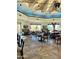 Elegant dining area with high ceilings, lots of natural light and scenic views at 9110 E Clubhouse Ct # 639, Scottsdale, AZ 85262