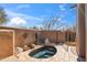 Secluded hot tub area surrounded by desert landscaping, offering a private and tranquil spa experience at 9110 E Clubhouse Ct # 639, Scottsdale, AZ 85262