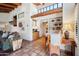 Spacious living room boasts wood beam ceilings, Saltillo tile, and neutral decor at 9110 E Clubhouse Ct # 639, Scottsdale, AZ 85262