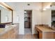 Elegant bathroom featuring granite counters, double sinks, and ample cabinet space at 9110 E Clubhouse Ct # 639, Scottsdale, AZ 85262
