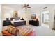 Spacious main bedroom with a ceiling fan and a relaxing sitting area at 9110 E Clubhouse Ct # 639, Scottsdale, AZ 85262