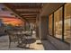 Charming covered patio with elegant seating, offering a comfortable space for outdoor dining and entertaining at 9110 E Clubhouse Ct # 639, Scottsdale, AZ 85262
