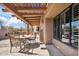 Wonderful outdoor patio features dining table and desert landscaping for serene outdoor living at 9110 E Clubhouse Ct # 639, Scottsdale, AZ 85262