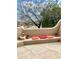 Relaxing outdoor patio with decorative cushions and desert landscaping offers serene outdoor living at 9110 E Clubhouse Ct # 639, Scottsdale, AZ 85262