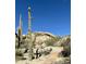 Scenic view of walking trails and distinctive rock formations with desert plants at 9110 E Clubhouse Ct # 639, Scottsdale, AZ 85262