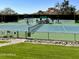 Outdoor tennis courts at a property with lush landscaping and mountain views in the background at 9110 E Clubhouse Ct # 639, Scottsdale, AZ 85262
