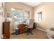 Office featuring a desk, chair, and window at 9630 E Hay Loft Dr, Florence, AZ 85132