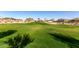 Expansive green space with playground, perfect for recreation and enjoying the outdoors at 1060 W Castle Ct, Casa Grande, AZ 85122