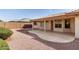 A backyard patio, perfect for entertaining guests with plenty of space and desert landscaping at 10856 E Kiva Ave, Mesa, AZ 85209