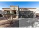 Charming home featuring a well-manicured yard and a two-car garage at 11230 E Cliffrose Ln, Florence, AZ 85132