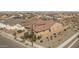 Aerial view of a single-Gathering home, with a red tile roof, and mature landscaping surrounding the property at 11529 N 170Th Ln, Surprise, AZ 85388