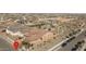 Aerial view of a single-Gathering home, with a red tile roof, surrounded by a landscaped neighborhood at 11529 N 170Th Ln, Surprise, AZ 85388