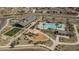 Aerial view of community amenities, including a pool, playground, and clubhouse at 11529 N 170Th Ln, Surprise, AZ 85388