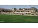 Community basketball court surrounded by grassy area and landscaping at 11529 N 170Th Ln, Surprise, AZ 85388