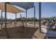 Community playground featuring climbing structure, slide, and wood chip ground cover at 11529 N 170Th Ln, Surprise, AZ 85388