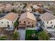 A spacious backyard with a large lawn, covered patio, playground and shed at 12118 W Villa Chula Ct, Sun City, AZ 85373