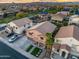 Aerial view of a neighborhood featuring well-kept homes, lush landscaping, and convenient parking at 12118 W Villa Chula Ct, Sun City, AZ 85373