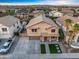 Beautiful two-story home featuring a well-manicured lawn and a two car garage at 12118 W Villa Chula Ct, Sun City, AZ 85373