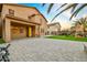 Home's backyard with trampoline, playset, and manicured lawn at 12118 W Villa Chula Ct, Sun City, AZ 85373