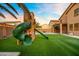 Backyard play-set with slide and swing at 12118 W Villa Chula Ct, Sun City, AZ 85373