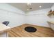 Spacious dressing room with shelves, lighting, wood floors, and a vanity at 12118 W Villa Chula Ct, Sun City, AZ 85373