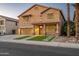 Beautiful two-story home with a two-car garage, and a well-maintained yard with artificial turf at 12118 W Villa Chula Ct, Sun City, AZ 85373