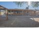 Fully fenced backyard with a covered patio provides a private outdoor space at 13134 N 20Th Ave, Phoenix, AZ 85029