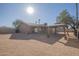 Large, fully fenced backyard features a covered patio, gazebo, and a low-maintenance landscape at 13134 N 20Th Ave, Phoenix, AZ 85029