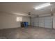 Attached two-car garage with ample storage space, and a functional garage door opener at 13134 N 20Th Ave, Phoenix, AZ 85029