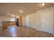 Functional kitchen area featuring a breakfast bar, black appliances, and convenient access to adjacent rooms at 13134 N 20Th Ave, Phoenix, AZ 85029