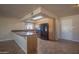 Well-lit kitchen area features ample cabinet space, stainless steel appliances, and granite countertops at 13134 N 20Th Ave, Phoenix, AZ 85029