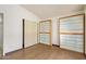 Bonus Room with sliding door closet and two display shelves at 14224 N 26Th Ln, Phoenix, AZ 85023