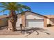 Charming single-story home with a well-maintained yard and a two-car garage, enhancing curb appeal at 14224 N 26Th Ln, Phoenix, AZ 85023