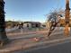 Exterior showcasing the home's facade, fenced yard, and landscaping at 1434 E Roosevelt St, Phoenix, AZ 85006