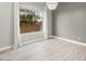 Bright living room with wood flooring and natural light at 14425 N 137Th Ln, Surprise, AZ 85379