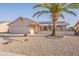 Inviting single-story home with desert landscaping and solar panels, offering energy efficiency and charm at 14510 W Yosemite Dr, Sun City West, AZ 85375