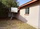 Exterior of home with a basketball hoop at 1466 E Nielson Ave, Mesa, AZ 85204