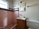 Standard bathroom featuring pink tile and a vanity at 1466 E Nielson Ave, Mesa, AZ 85204