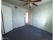 Image of a bedroom featuring neutral walls and a ceiling fan at 1466 E Nielson Ave, Mesa, AZ 85204